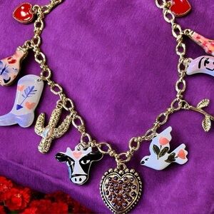 Adorable fun and cute charm necklace. Love potion charm. Cow. Cowboy boot. Charm